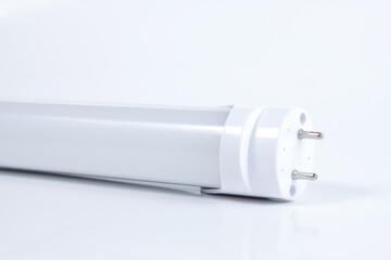 Close-up of LED fluorescent light tubes with white background