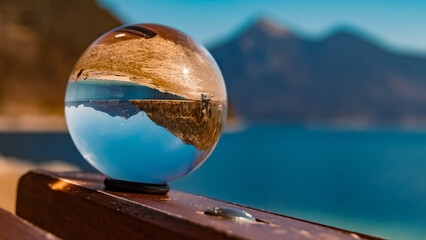 Crystal ball alpine landscape shot at the famous Walchensee lake, Bavaria, Germany