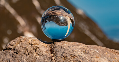 Crystal ball alpine landscape shot at the famous Walchensee lake, Bavaria, Germany