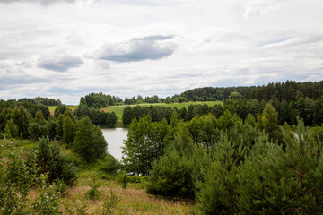 Fototapeta na wymiar river and lake in cloudy weather in summer