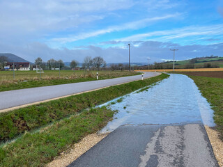 High water and flooding on the bike path. A classic planning error.