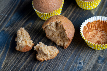 delicious wheat cupcakes on a black wooden table