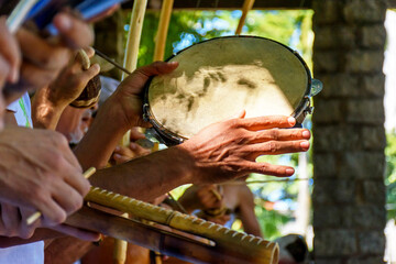 Tambourine and others usually rustics brazilian percursion instruments used during capoeira brought...