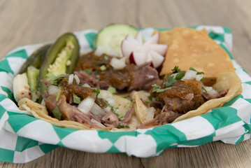 Carnitas street pork tacos on small tortillas for that perfect eating size for lunch