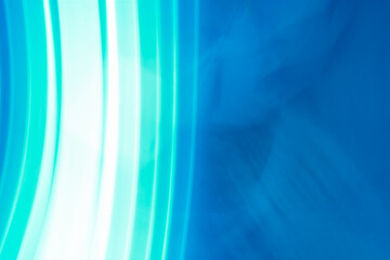 Horizontal blue abstract background with vertical highlights to white in the form of lines.