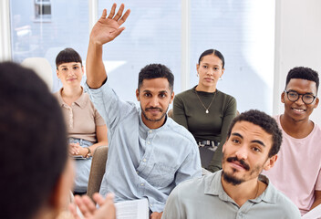 If you want to know more, you have to ask more questions. Shot of a young businessman raising his hand during a presentation in an office.