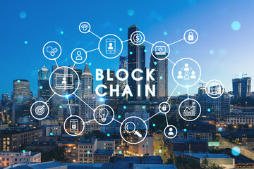Fototapeta premium Illuminated aerial cityscape of Seattle, downtown at night time, Washington, USA. Decentralized economy. Blockchain, cryptography and cryptocurrency concept, hologram