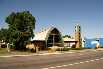 Fototapeta na wymiar Saint Pauls Anglican Church in Proserpine with its unusual curved architectural shape.