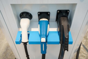 Photograph of the modern electric vehicle charging station or EV quick charging station.