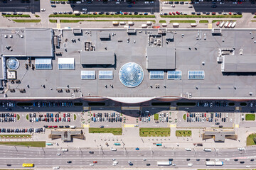 shopping mall rooftop with air conditioners and skylight domes. aerial top view.