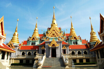 Phra Mahathat Chedi Phakdee Prakat Buddhist temple on top of hill for thai people and foreign travelers travel visit and respect praying buddha at Bang Saphan city in Prachuap Khiri Khan, Thailand