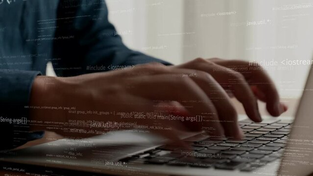 Computer programmer uses capable laptop computer to develop programming code of new software . Computer specialist working on future coding application for software programming development .