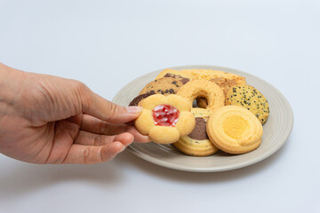 Different types of sweet cookies in bowls