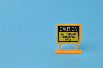 Caution sign isolated on a blue background