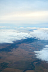 Have you got your head in the clouds. Shot of a cloudy view seen from an airplane window.