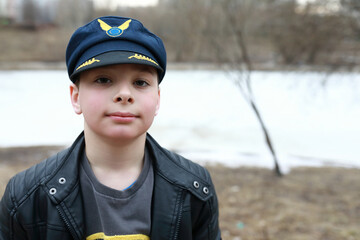 Portrait of child in flight cap