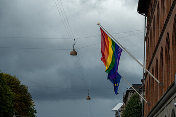 View of the Pride lgtb Flag waving under the rain 