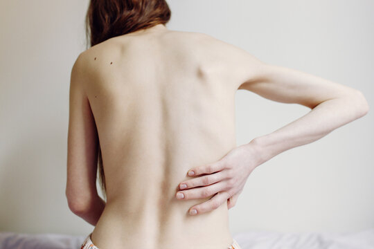 Osteoporosis of the spine, Scoliosis and a sore back after work. Problems with the spinal cord in women.