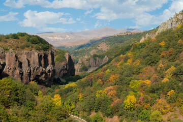 Fototapeta na wymiar Picturesque view to scenic landscape ravine. canyon and gorge in Armenia near Jermuk town. Forest meadows and hills. River gorge in mountains panorama stock photography