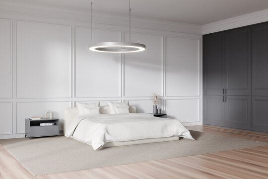 Light bedroom interior with bed, nightstand and decoration