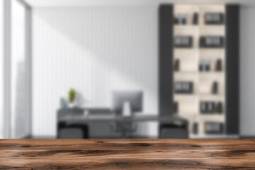 Wooden desk on blurred background of ceo room interior. Mockup