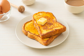 French toasted with butter and honey
