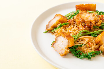 Stir-fried rice vermicelli and water mimosa with crispy pork belly