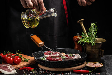 Chef in kitchen cooking beef steak on grill pan. Beef medallions wrapped in bacon with rosemary and spices, Restaurant menu, dieting, cookbook recipe top view