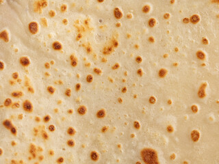 Pan fried pancake as a background.