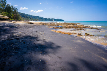 black sand beach on Nang Thong Beach in Khaolak - obrazy, fototapety, plakaty