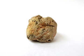 Macro shooting specimen pumice rock isolated on white background. floating rock.