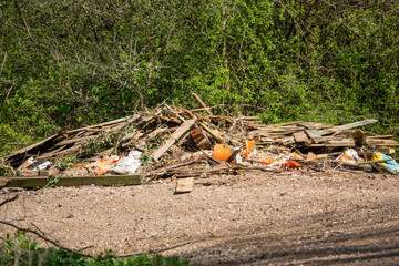 fly tipping by a fencing contractor, spoiling open countryside