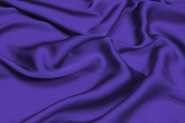 Purple silk or satin luxury fabric texture can use as abstract background.