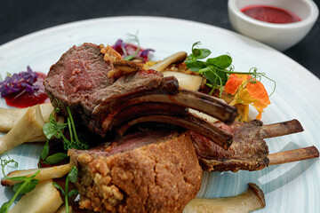 Grilled roe deer with sauce and mushrooms