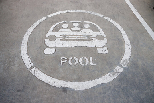 Carpool Sign On Concrete Floor At Parking Lot.