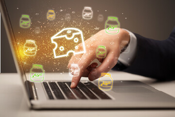 Hand searching for recipes on the internet