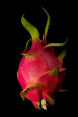Fresh dragon fruit closeup on black background