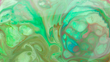 Psychedelic fluid art background. Multicolored stains on a liquid surface. Creative background with colored spots. Trendy abstract backdrop