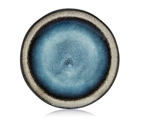 Plate on a white isolated background. View from above. Small flat round plate.