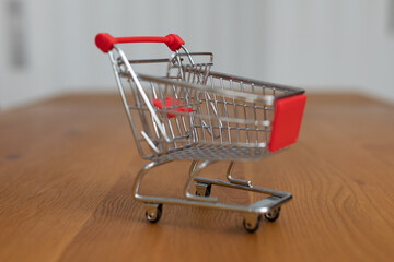 Shopping cart on modern background.