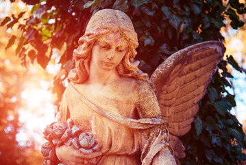 Positive, affirming image with an angel figure in sunlight. A symbol of hope, comfort, compassion...