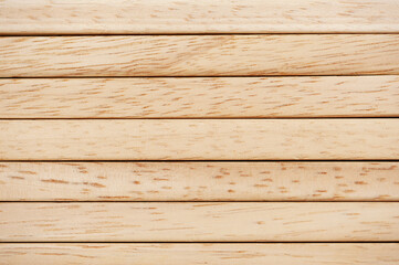 Smooth wooden plank with background texture
