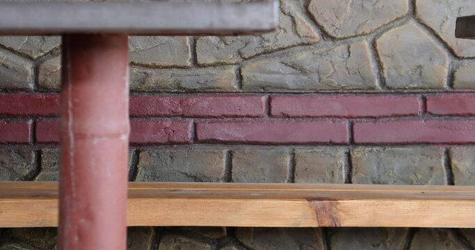 Part of a close-up of the interior of a roadside picnic shelter. They were shot in smooth motion with a professional motorized video slider.