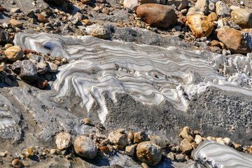 Salt layers on the Dead Sea. Abstract texture. Israel