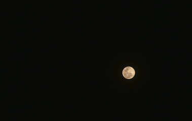 full moon on dark sky in night