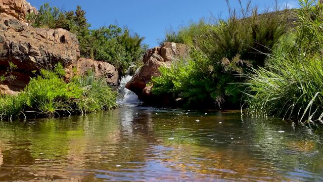 Small waterfall into natural pool at Maalgat in the Cederberg, South Africa