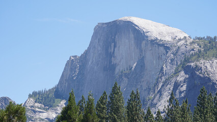 El Capitan and Half Dome granite monolith mountain peaks in the Yosemite National Park of...