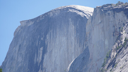 El Capitan and Half Dome granite monolith mountain peaks in the Yosemite National Park of California, USA.
