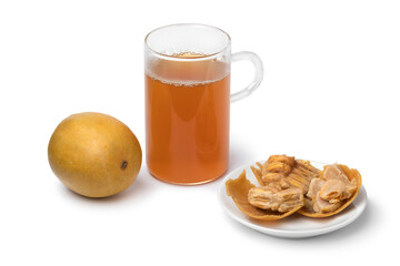 Tea glass with monk fruit tea isolated on white background close up