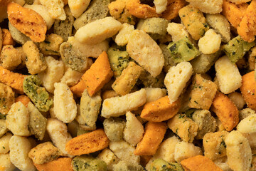 Colorful Moroccan miniature shortbread cookies called  Krichlate, snack for Ashura, close up full frame as background 